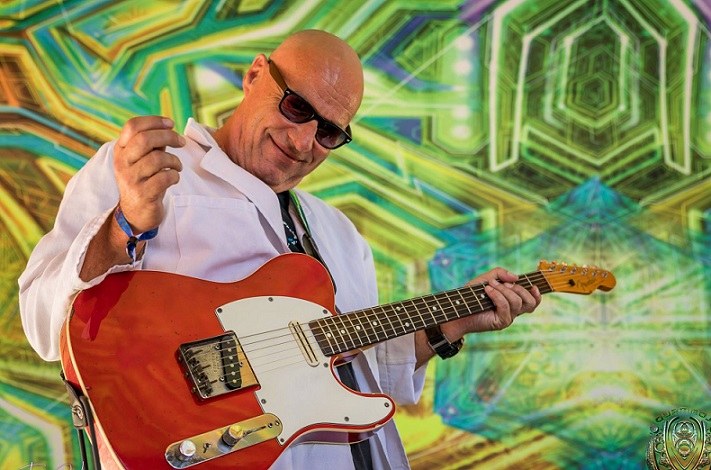 James Kibby playing a red Telecaster on stage